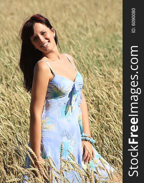 Beautiful Girl In Wheat Field