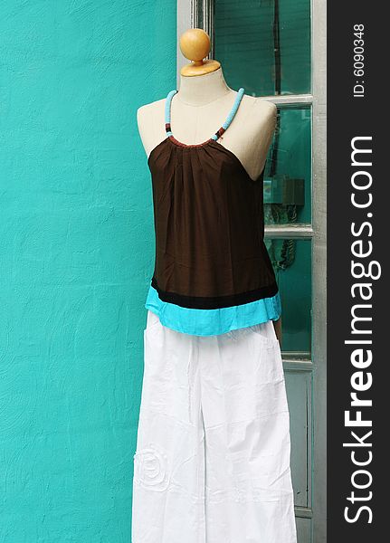 Modern summer clothing on a fashion mannequin.