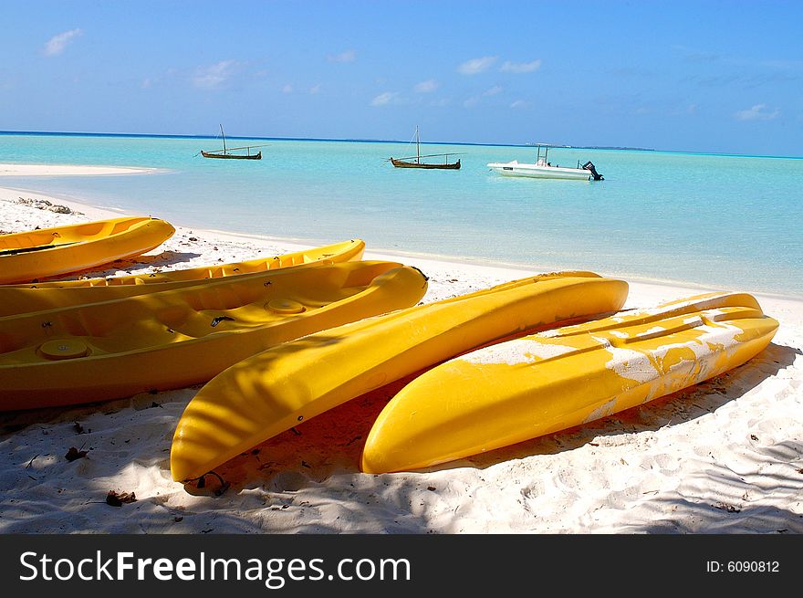 Fishing boat on the white beach