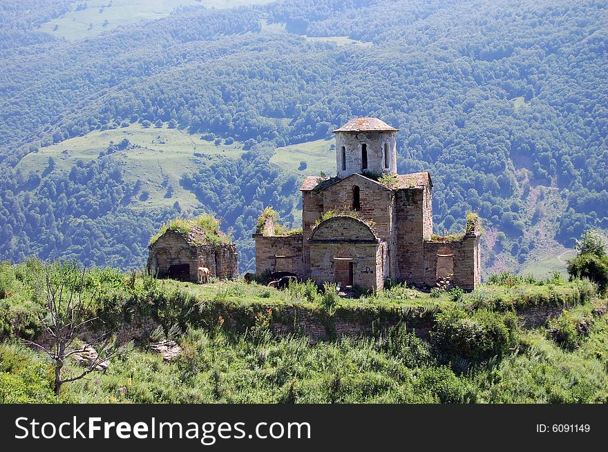 The ancient orthodox temple located in mountains. The ancient orthodox temple located in mountains