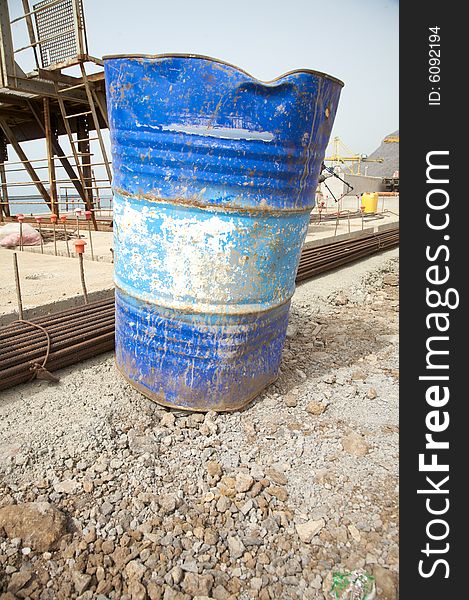 Old blue barrel on a public work. Old blue barrel on a public work