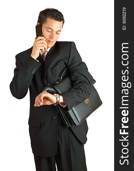 Businessman With Cellphone And Briefcase