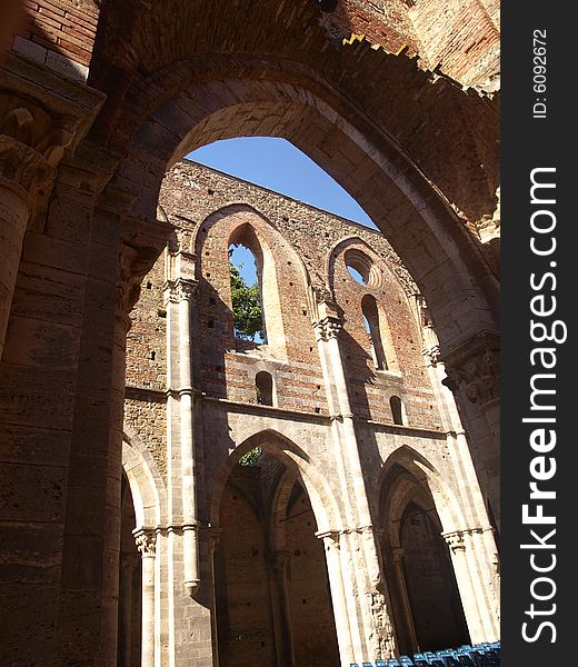 A beautiful glimpse of the indoor vaults of the uncover abbey of San Galgano in Tuscany. A beautiful glimpse of the indoor vaults of the uncover abbey of San Galgano in Tuscany