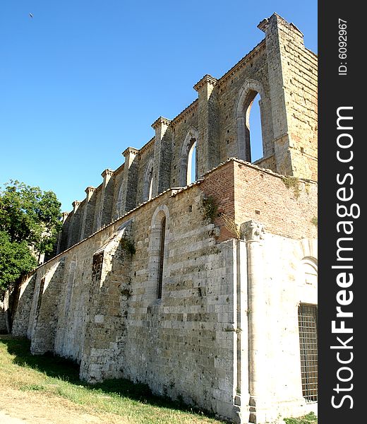 Agood shot of the outdoor aisle of San Galgano abbey