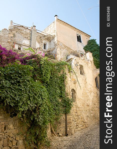 An alley of Old Bussana, near Sanremo (Liguria) in Italy. The village was devasted by an earthquake the 23th of february 1887. An alley of Old Bussana, near Sanremo (Liguria) in Italy. The village was devasted by an earthquake the 23th of february 1887.