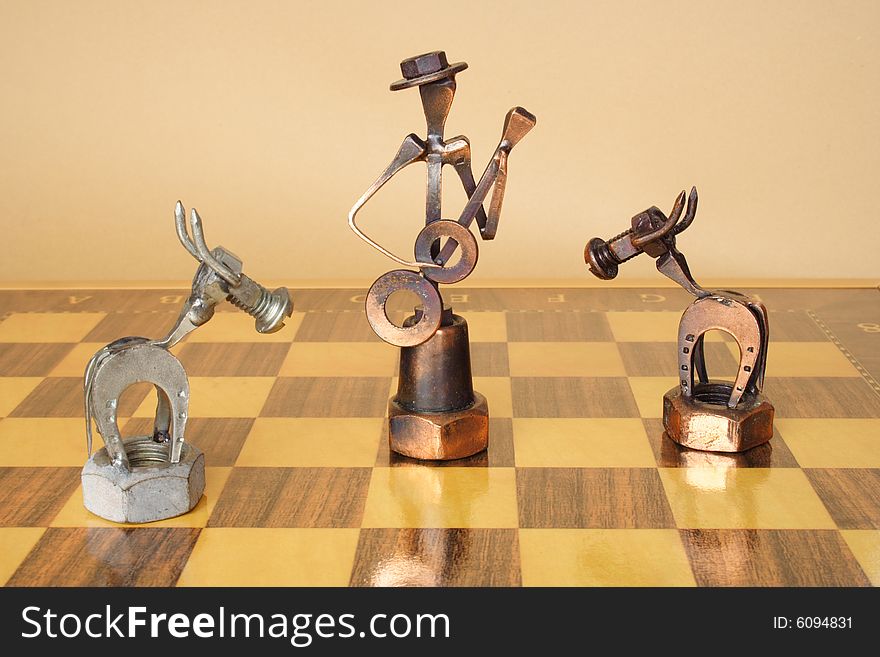 Knights and king figures over chess board. Knights and king figures over chess board