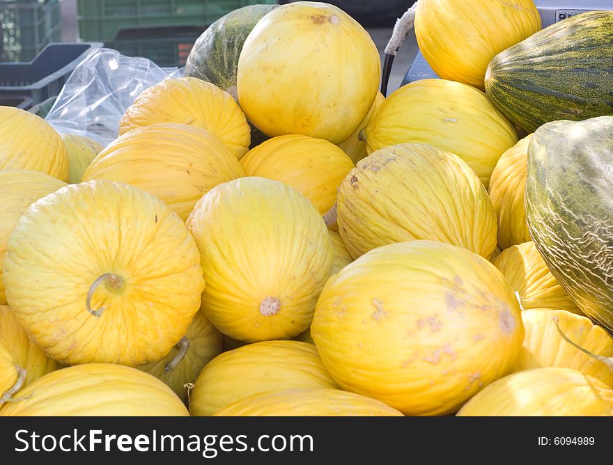 Yellows melons close up in street market