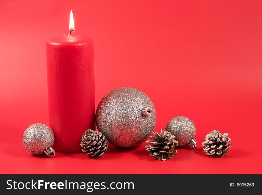 Christmas decoration on a red background (place for the text)