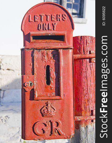 Historical mailbox with royal crest of King George