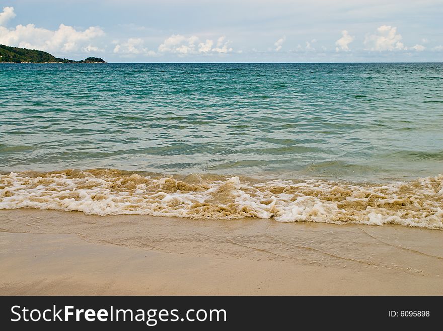 Breaking sea wave at Patong beach, Phuket, Thailand. Breaking sea wave at Patong beach, Phuket, Thailand