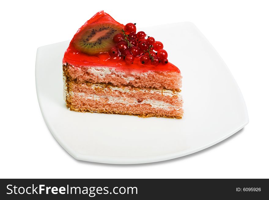 Pie with a red currant on a white plate