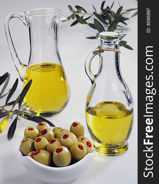 Green olives with olive oil.