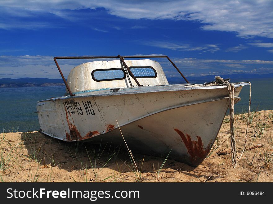 Rusty Broken boat on the beach