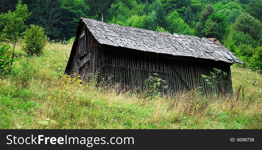 Wooden barn in romanian countryside