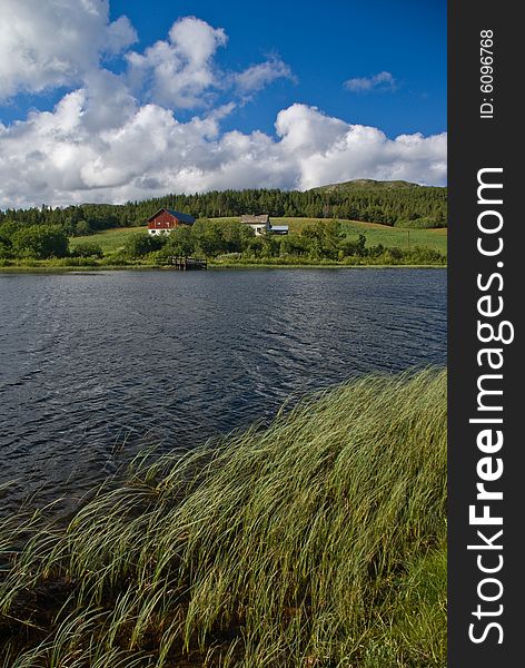 Norway landscape with typical cabin and lake. Norway landscape with typical cabin and lake