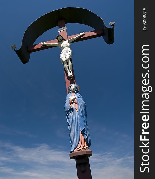 Cross with Jesus Christ and Madonna along a footpath in Bavaria. Cross with Jesus Christ and Madonna along a footpath in Bavaria