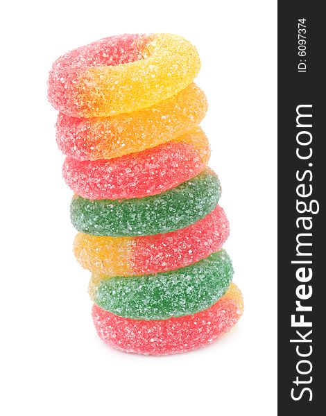 Stack of multicolored candies isolated on white. Stack of multicolored candies isolated on white.