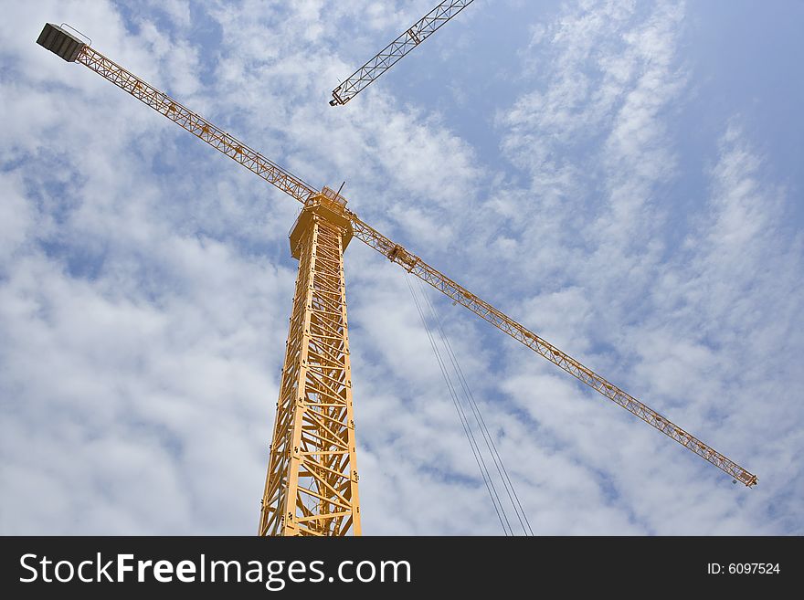 High crane and beautiful sky. Photo taken form under. High crane and beautiful sky. Photo taken form under.
