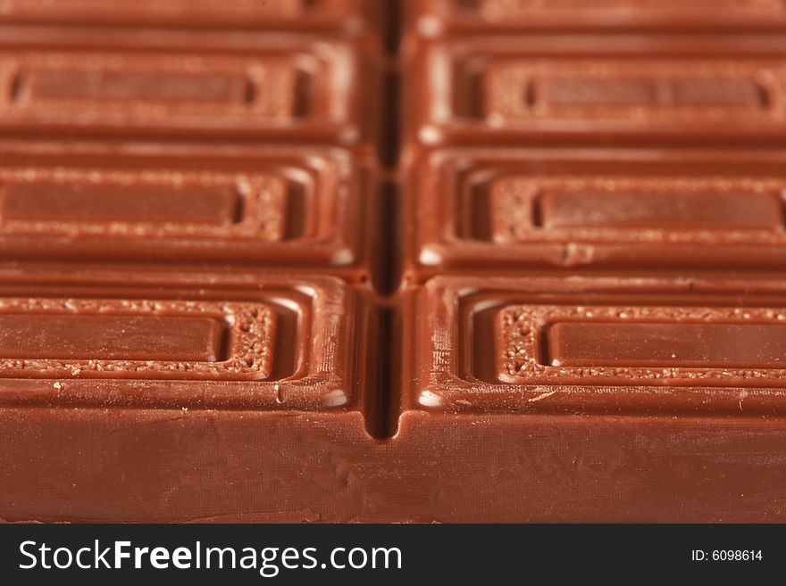 Milk chocolate isolated on white, shot in studio