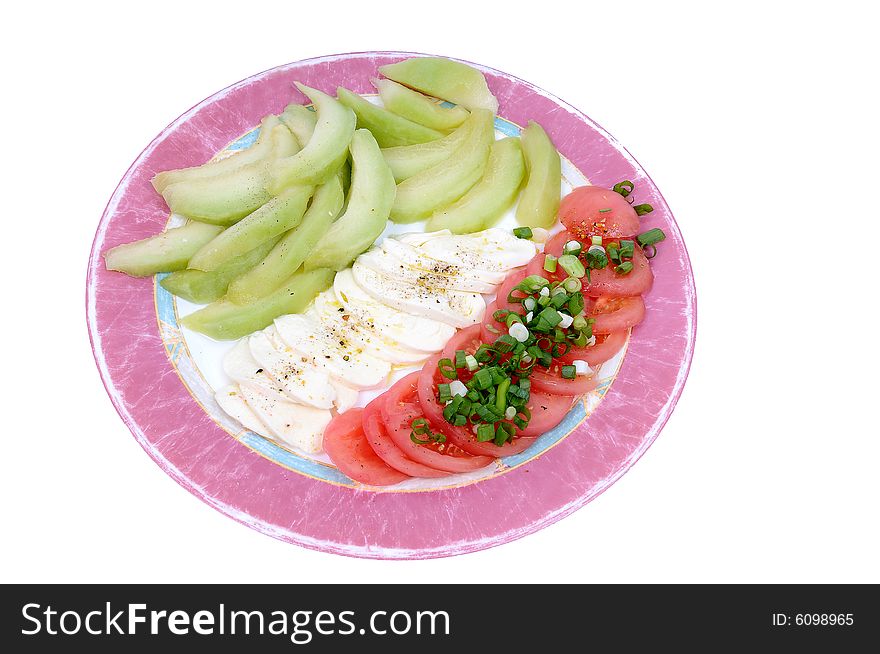 Image of a fresh salad with tomatoes, zucchini and feta. Image of a fresh salad with tomatoes, zucchini and feta