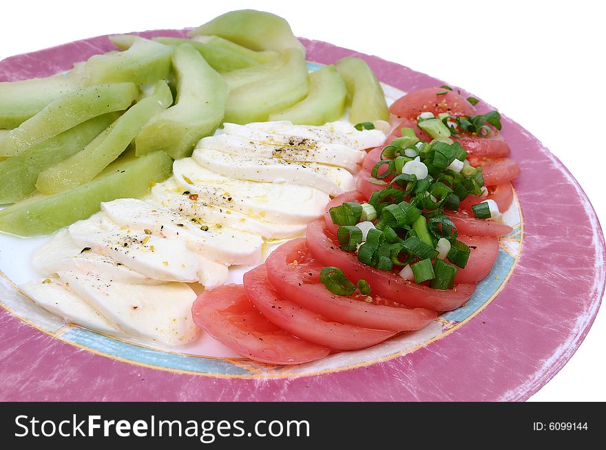 Image of a fresh salad with tomatoes, zucchini and feta. Image of a fresh salad with tomatoes, zucchini and feta