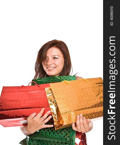 The young girl with packages after shopping.
