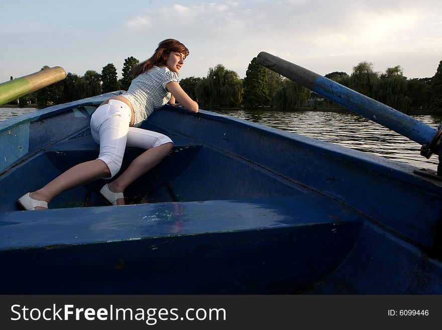 A beautiful lady alone on the boat. A beautiful lady alone on the boat