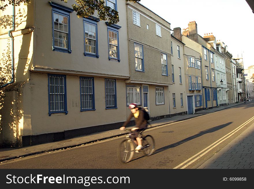 Cyclist in oxford during autumn. Cyclist in oxford during autumn