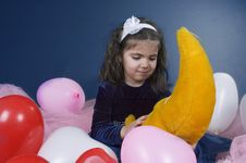 Sweet Young Girl Playing With Her Plush Moon Stock Photos Sweet Young Girl Playing With Her Plush Moon Stock Photos