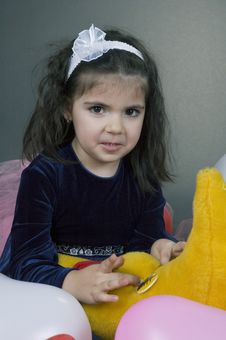 Sweet Young Girl Playing With Her Plush Moon Royalty Free Stock Image Sweet Young Girl Playing With Her Plush Moon Royalty Free Stock Image