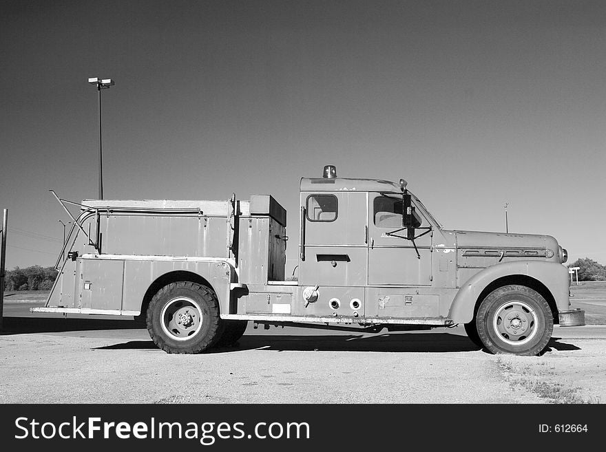 An antique fire truck. An antique fire truck