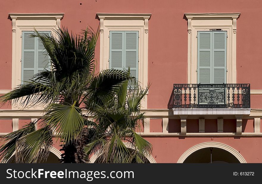Shuttered windows, a balcony, a palm tree - classic mediterranean!. Shuttered windows, a balcony, a palm tree - classic mediterranean!