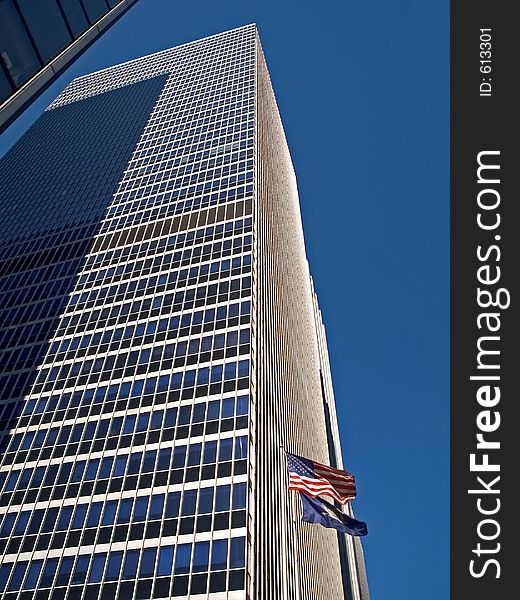 This is a shot of a tall office building in Manhattan. This is a shot of a tall office building in Manhattan.