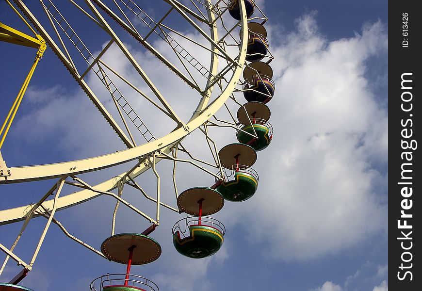 Ferris wheel from below. Ferris wheel from below