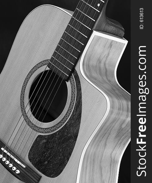 Black and White shot of an acoustic guitar. Black and White shot of an acoustic guitar