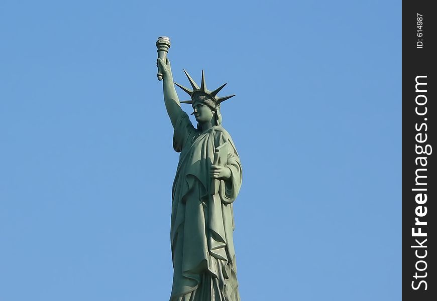 Statue of liberty in blue sky