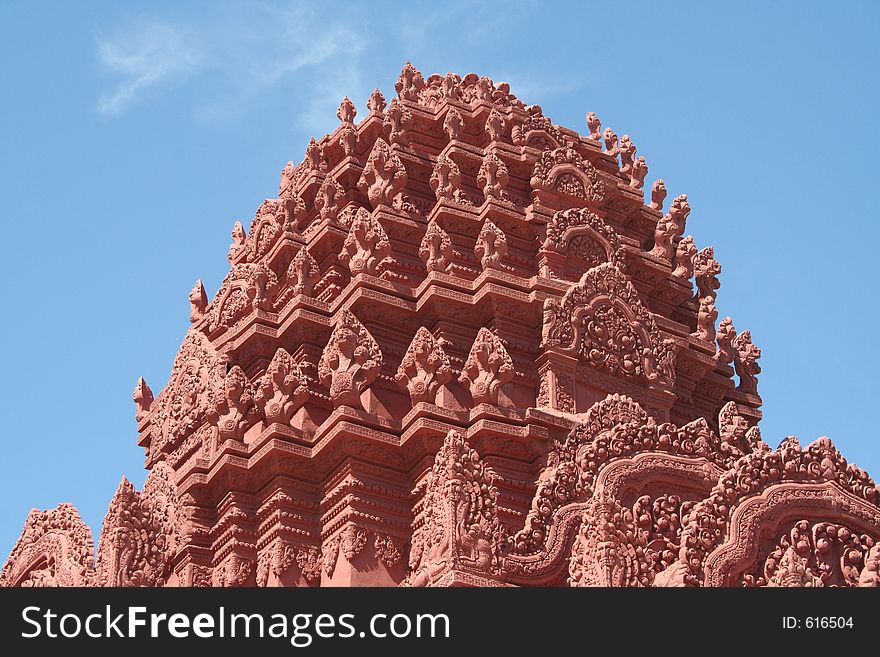 A dome littered with 5 headed cobras on a temple in Cambodia.