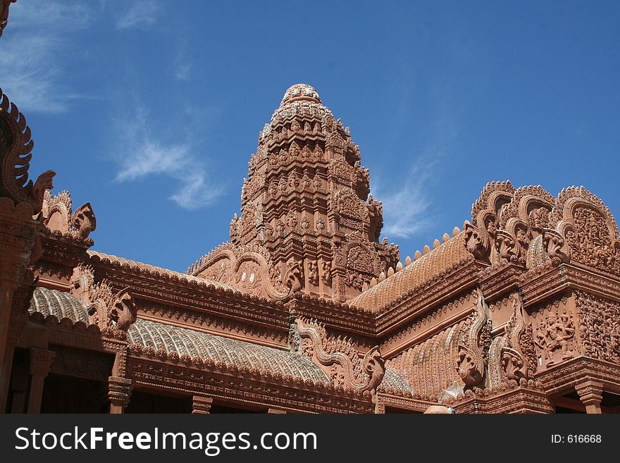 A traditional Cambodian Buddhist Temple in Phomn Penh. The temple is lined with Cobras and elephant statues. A traditional Cambodian Buddhist Temple in Phomn Penh. The temple is lined with Cobras and elephant statues.