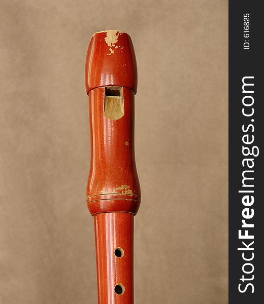 Flute on leather background