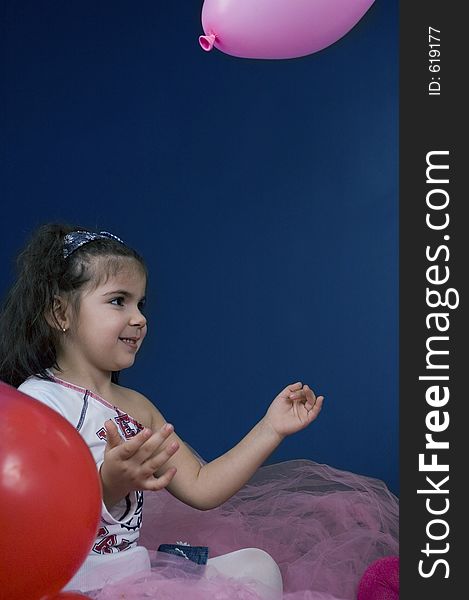 Girl Playing With Balloons