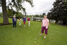 Women Playing Golf Stock Photography