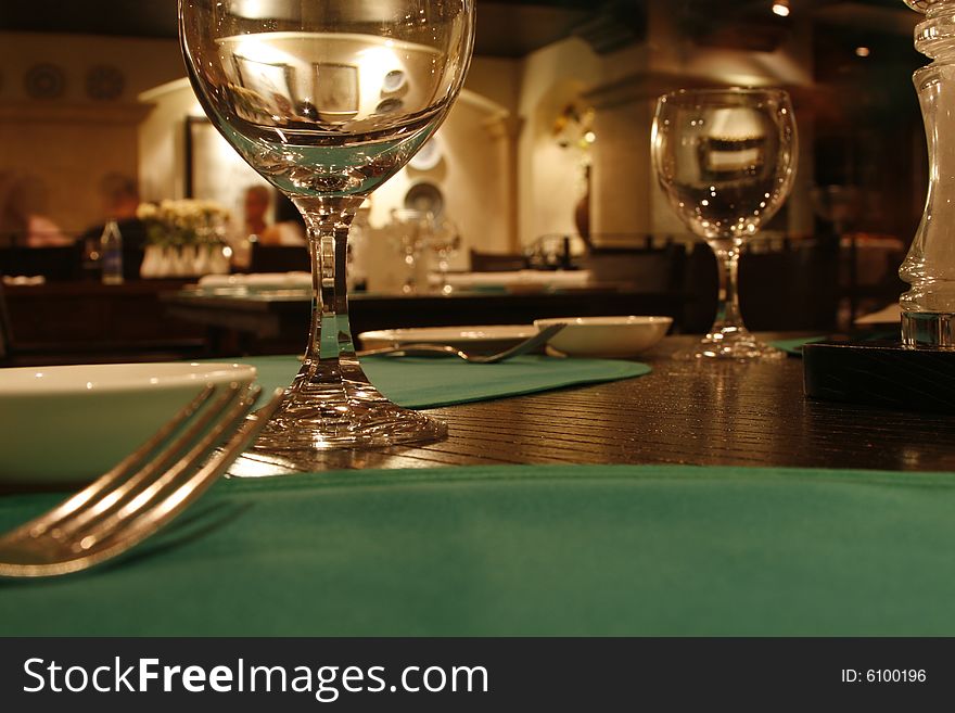 A romantic restaurant with fork and glasses. A romantic restaurant with fork and glasses