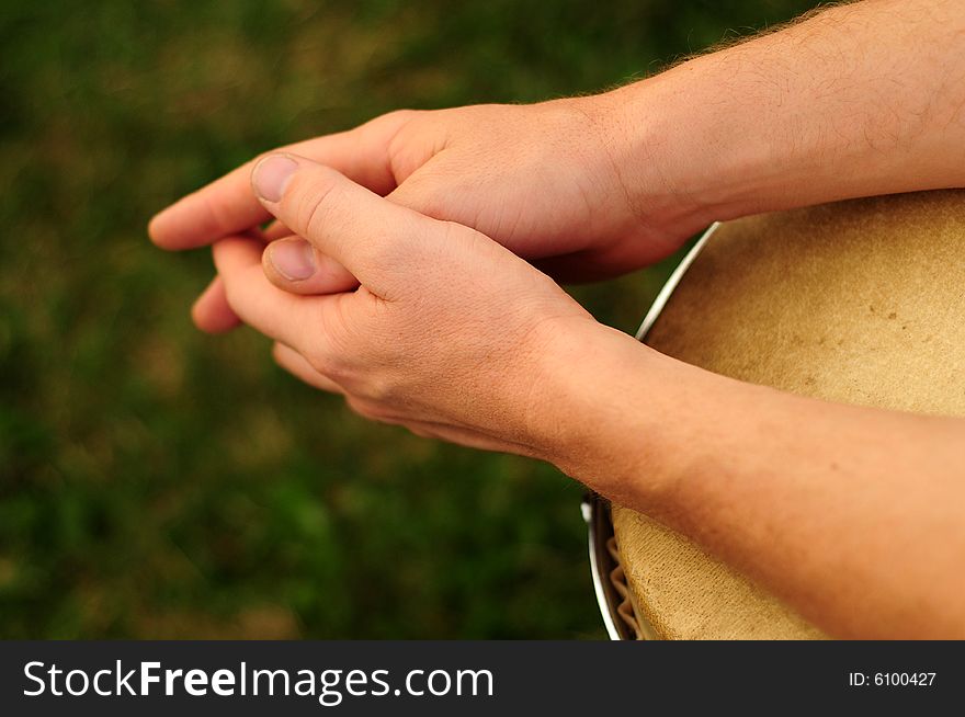 Close-up of drummer resting after playing percussion. Close-up of drummer resting after playing percussion