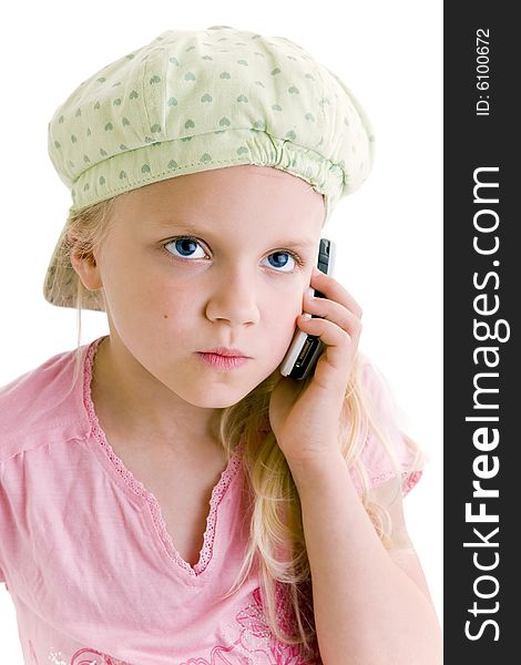 Young girl talking on the phone over white background. Young girl talking on the phone over white background