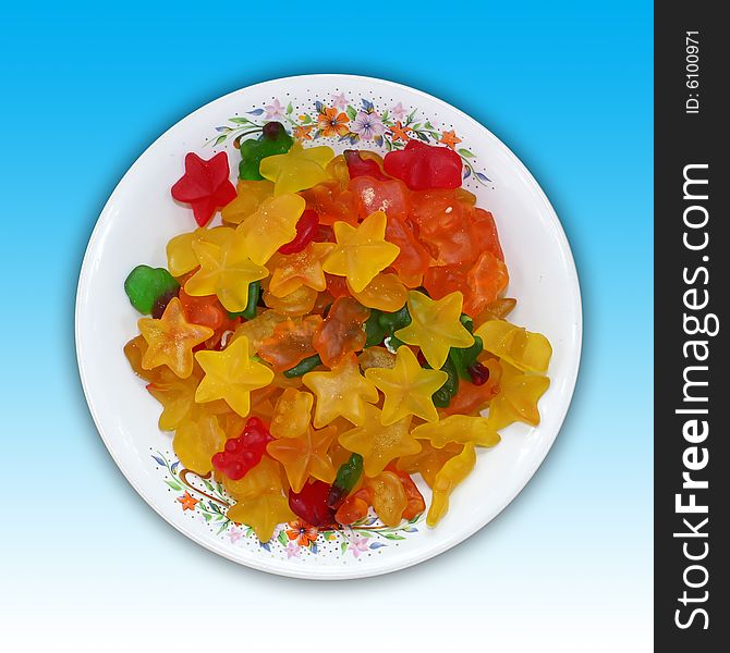 A plate of star and bear shaped jelly candies.
Including clipping path.