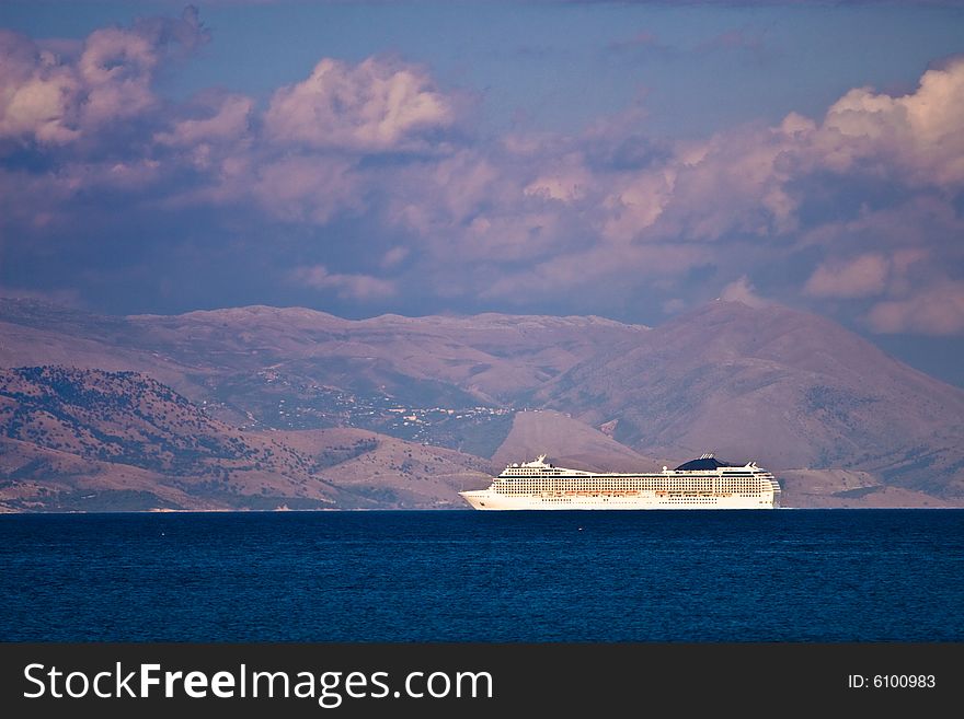 Cruise ship at sunset near Albania