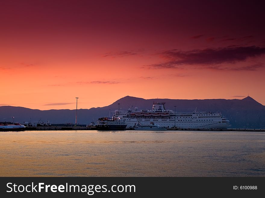 Cruise ship at sunset in greece