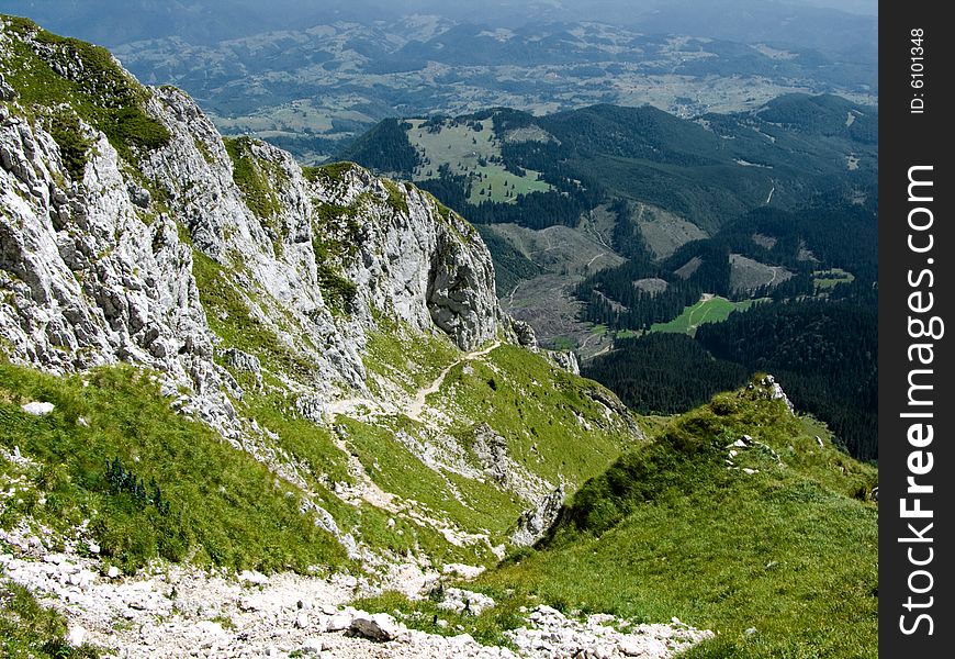 Piatra Craiului ridge, with maximum altitude of 2239 m, is one of the most spectacular mountains in Romania. Piatra Craiului ridge, with maximum altitude of 2239 m, is one of the most spectacular mountains in Romania.