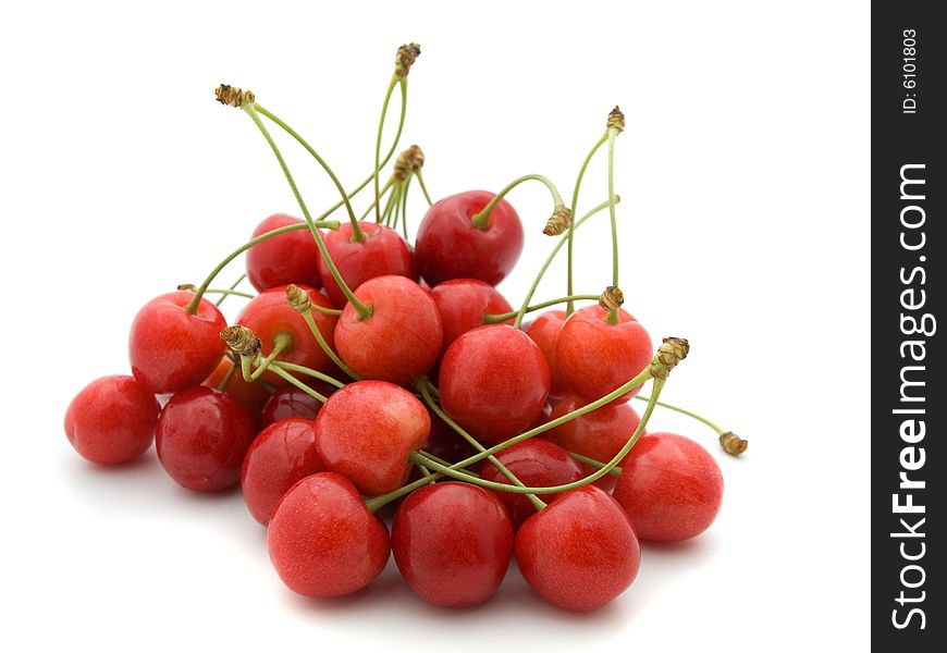 Wonderful red cherries on white background.