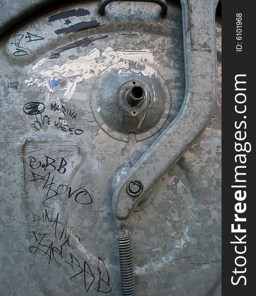 Photo of graffiti written trash can.